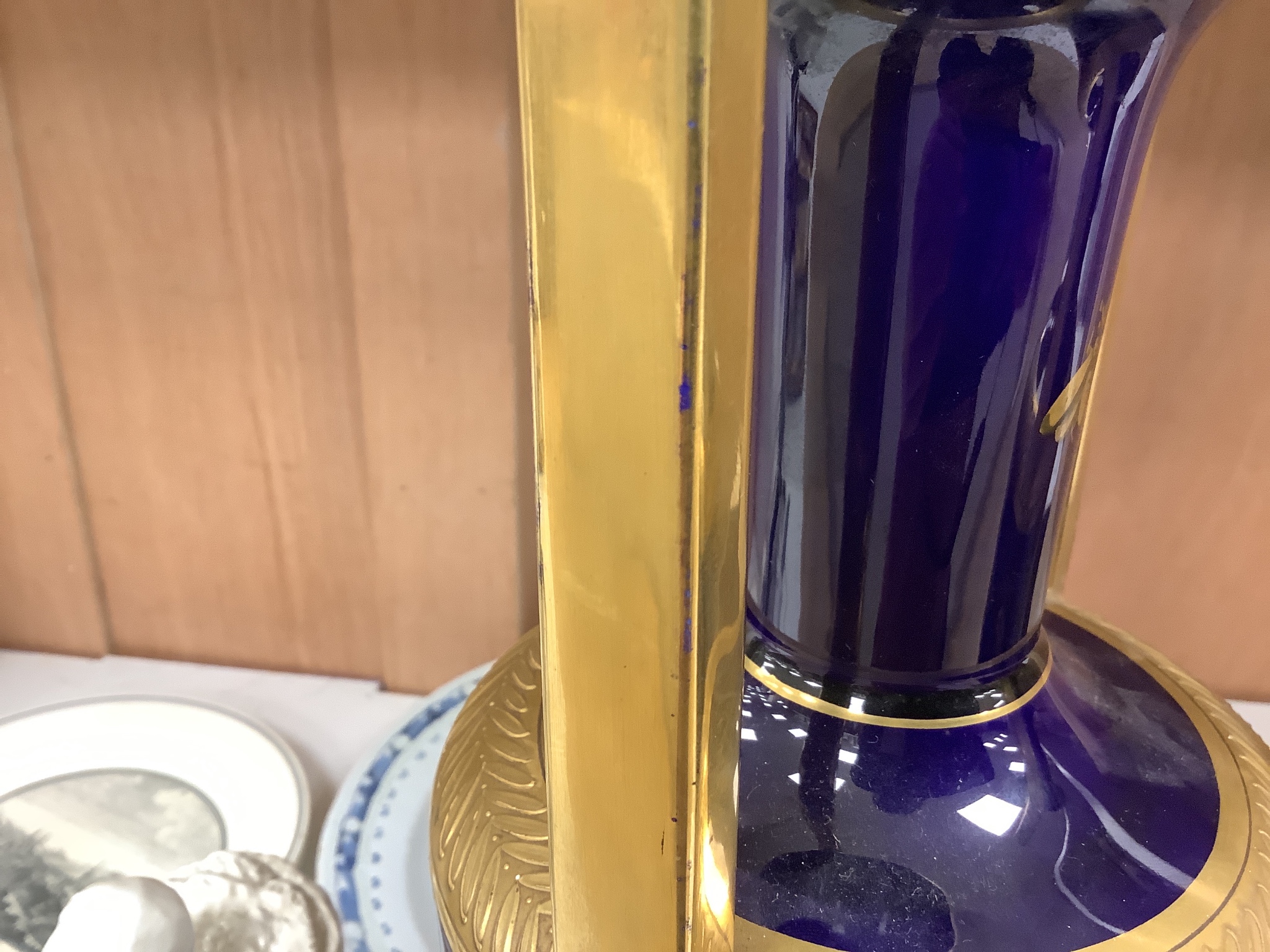 A pair of French gilt blue porcelain two handled vases, height 45cm